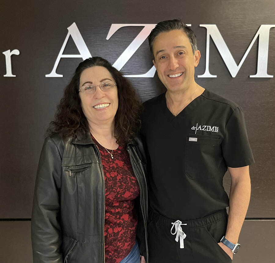 Dr. Azimi With a Patient